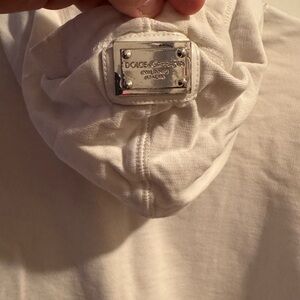 White Dolce Gabbana hoodie. Plaque detail on hoodie.